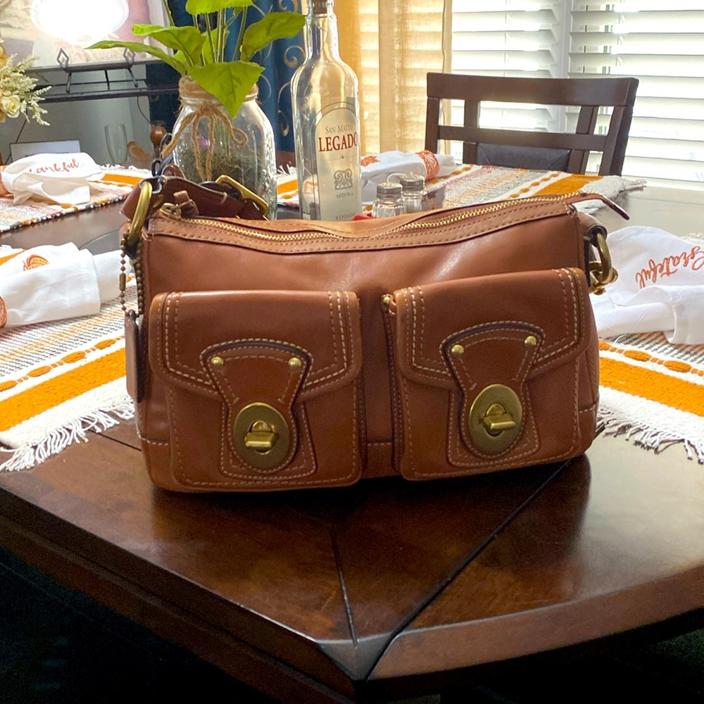 Coach tan leather purse.
